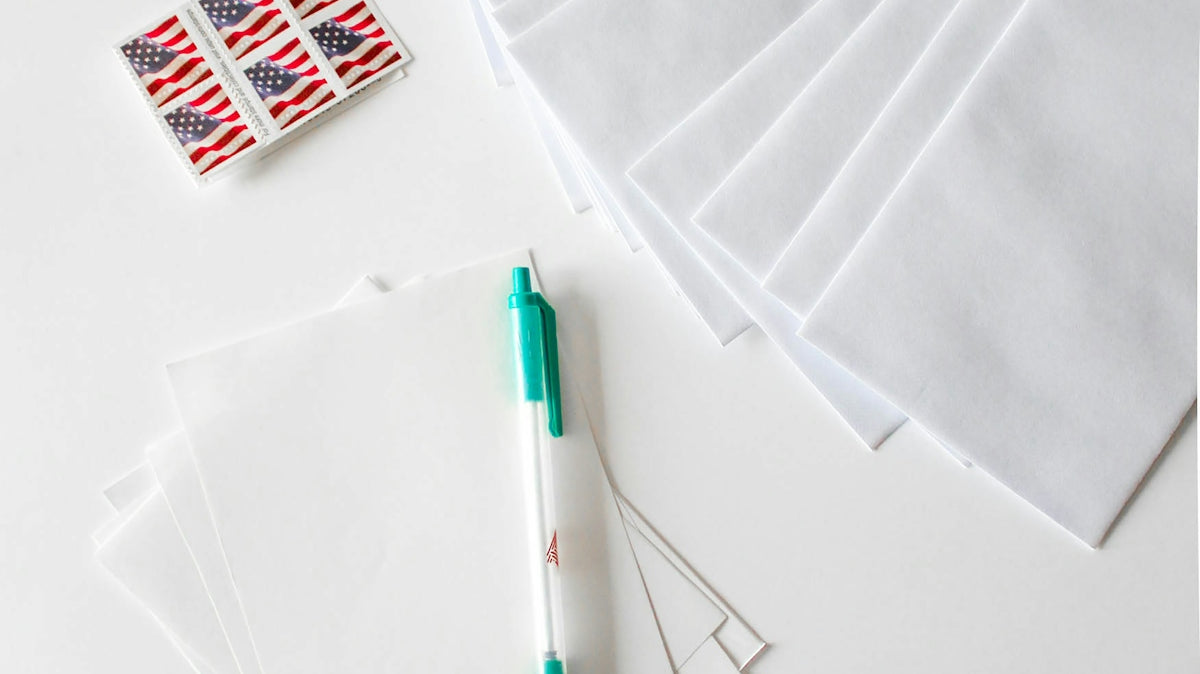 green click pen on white paper