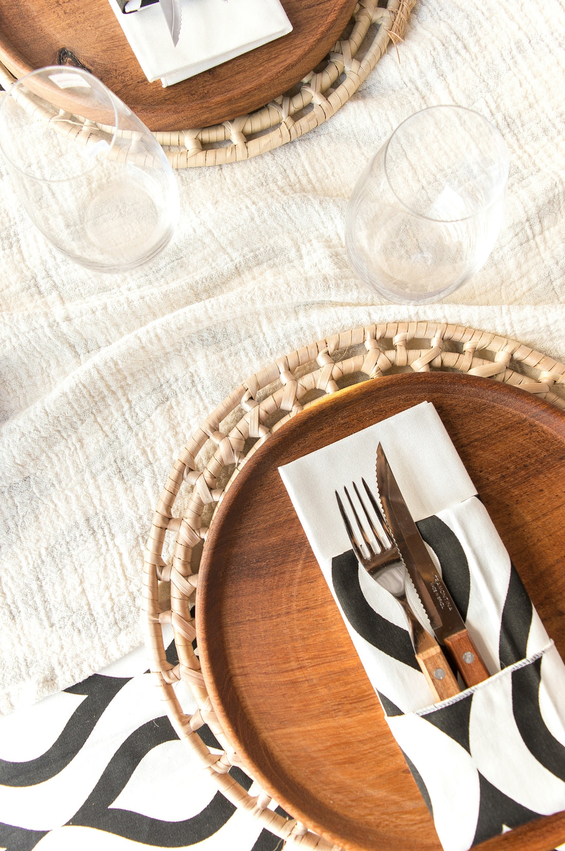 a wooden plate with a fork and knife on it
