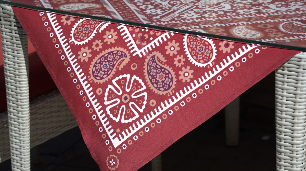 Red bandana pattern tablecloth on a table