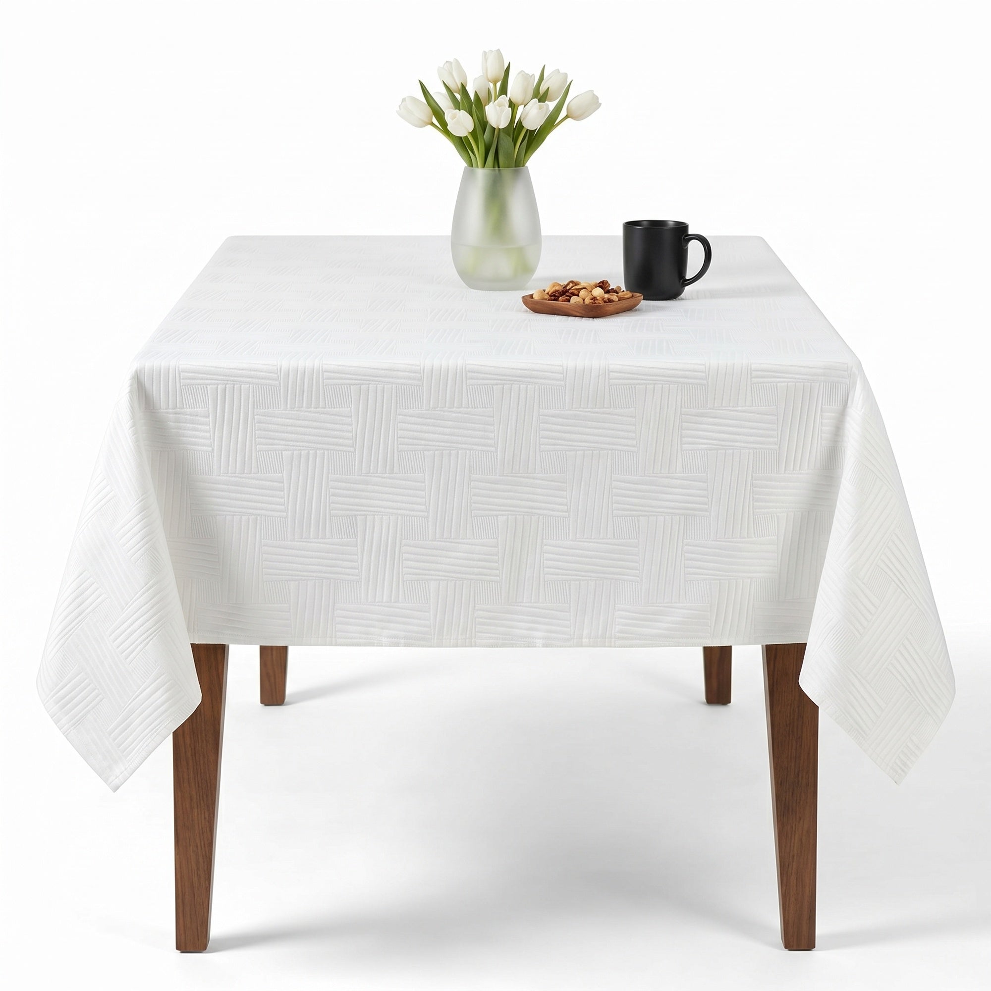 Crisp white tablecloth, restaurant table