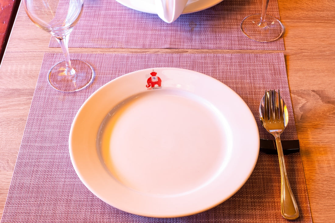 white ceramic plate on table