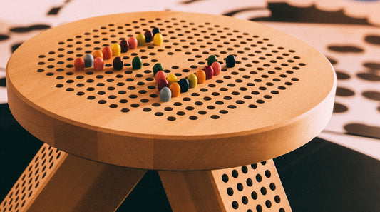 red and yellow beads on brown wooden round table