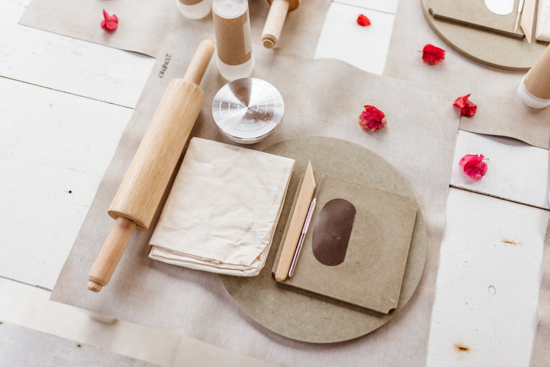A table topped with lots of different types of paper