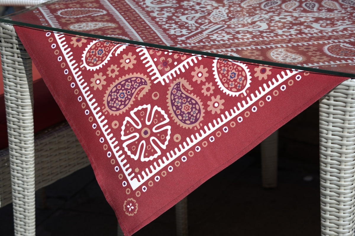 Red bandana pattern tablecloth on a table